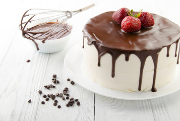The process of making chocolate Cake filled with glaze. Birds milk.