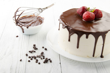 The process of making chocolate Cake filled with glaze. Birds milk.