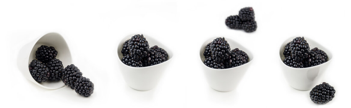 collection of blackberries in white ceramic bowls on white background isolated