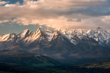 Obraz premium Cloudy Tatra mountains in the morning, covered with snow