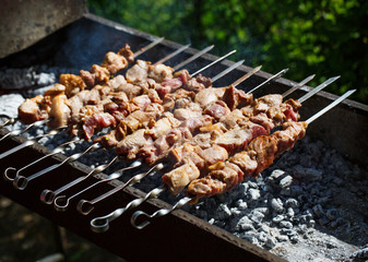 Cooking meat on the fire.