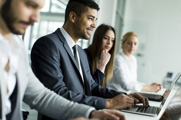 Young people working in office