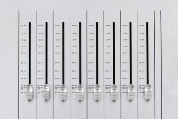 top view closeup of decibel level slider buttons in their idle position