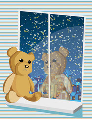 Teddy bear sitting on window