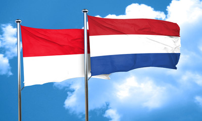 Fototapeta na wymiar monaco flag with Netherlands flag, 3D rendering