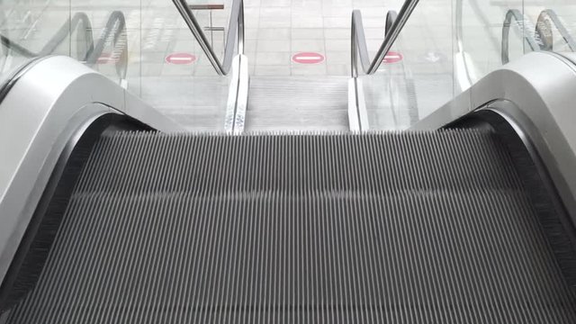 Escalator Moving Down with no One