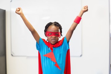 Boy pretending to be a superhero