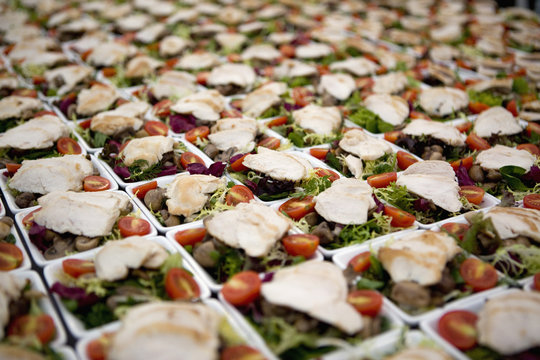 Dishes of salad arranged in rows
