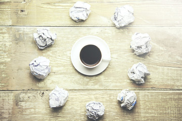 crumpled   papers and coffee