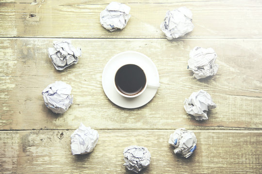 crumpled   papers and coffee