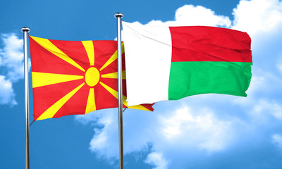 Macedonia flag with Madagascar flag, 3D rendering
