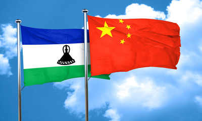Lesotho flag with China flag, 3D rendering