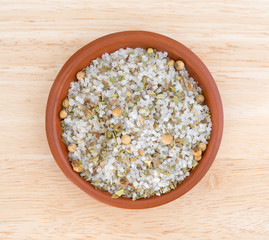 Simple Moroccan blend of spices in a bowl on a wood table top view