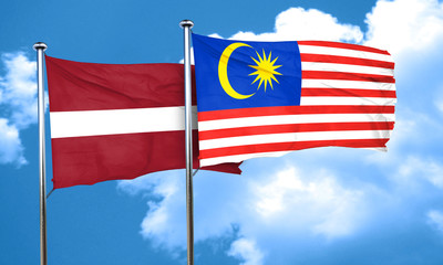 Latvia flag with Malaysia flag, 3D rendering