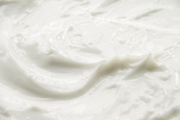 Cosmetics. Cream white background texture.