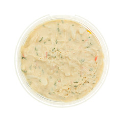 Lobster snack dip in an opened plastic container isolated on a white background.
