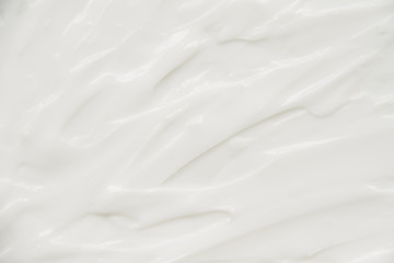 Cosmetics. Cream white background texture.