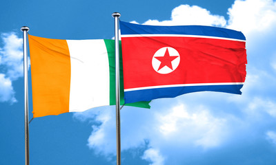 Ivory coast flag with North Korea flag, 3D rendering