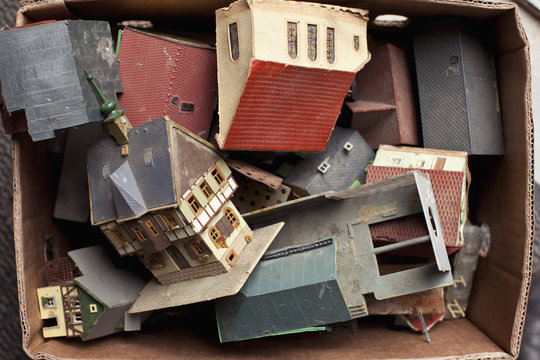 A box full of toy buildings