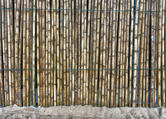 beautiful Bamboo fence on the sand