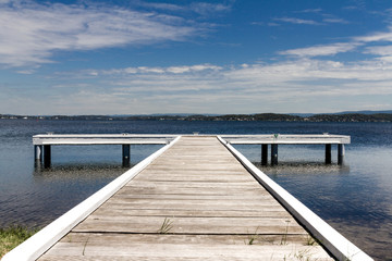 Fototapeta premium Dock at Lake on Sunny day