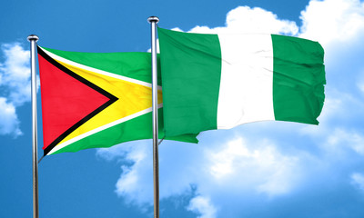 Guyana flag with Nigeria flag, 3D rendering