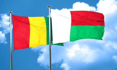 Guinea flag with Madagascar flag, 3D rendering
