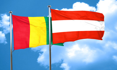 Guinea flag with Austria flag, 3D rendering