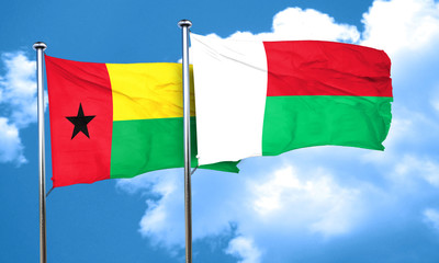Guinea bissau flag with Madagascar flag, 3D rendering