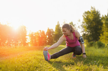 Exercise woman stretching hamstring leg muscles.