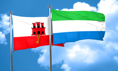gibraltar flag with Sierra Leone flag, 3D rendering
