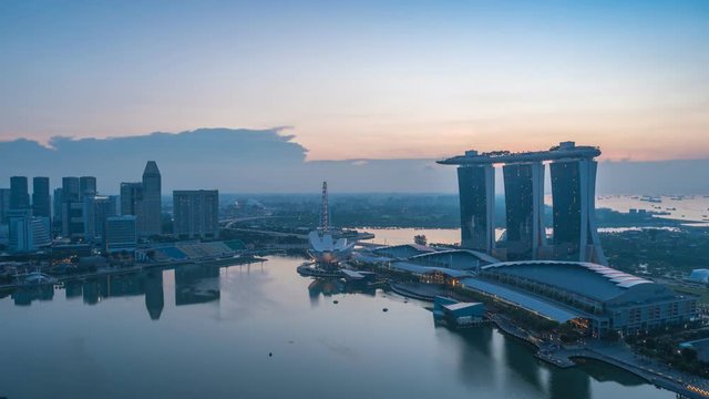 Sunrise at Singapore city skyline at Marina Bay, 4K Time lapse