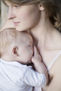 Mother and baby boy, close-up, portrait