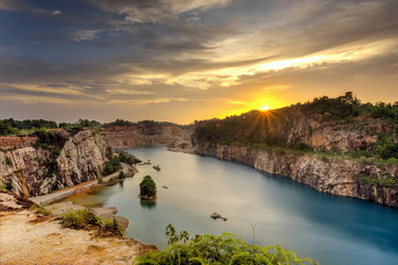 The Long Exposure blue Lake At Abandoned quarry during sunset
