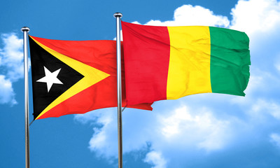 east timor flag with Guinea flag, 3D rendering