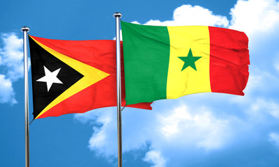 east timor flag with Senegal flag, 3D rendering