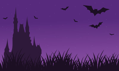 Silhouette of castle and bat twilight Halloween
