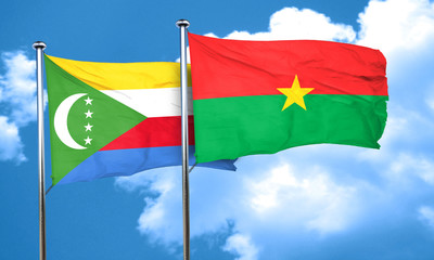 Comoros flag with Burkina Faso flag, 3D rendering