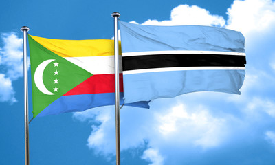 Comoros flag with Botswana flag, 3D rendering