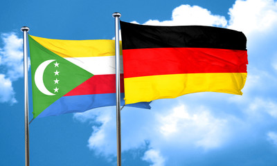 Comoros flag with Germany flag, 3D rendering