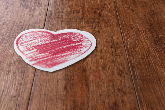 Red Heart Draw on Paper Wooden Floor