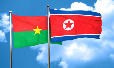 Burkina Faso flag with North Korea flag, 3D rendering