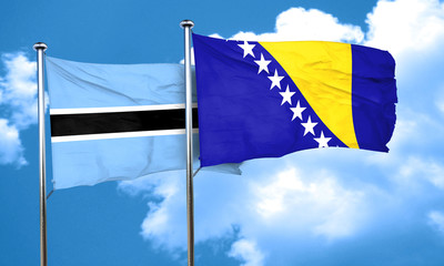 Botswana flag with Bosnia and Herzegovina flag, 3D rendering