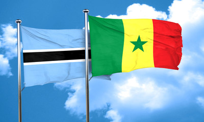 Botswana flag with Senegal flag, 3D rendering