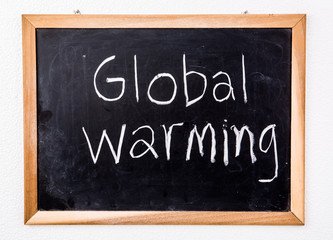 global warming word on blackboard