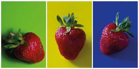 Fresh sweet strawberry on yellow, blue, green