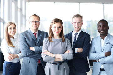 Face of beautiful woman on the background of business people