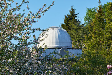 small hobby observatory, made from fiberglass, and attached to the roof of a small villa in Denmark