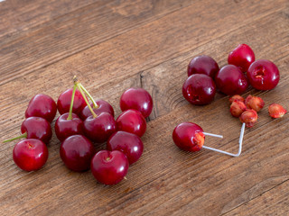 Sour cherry stone, pip removal with paperclip