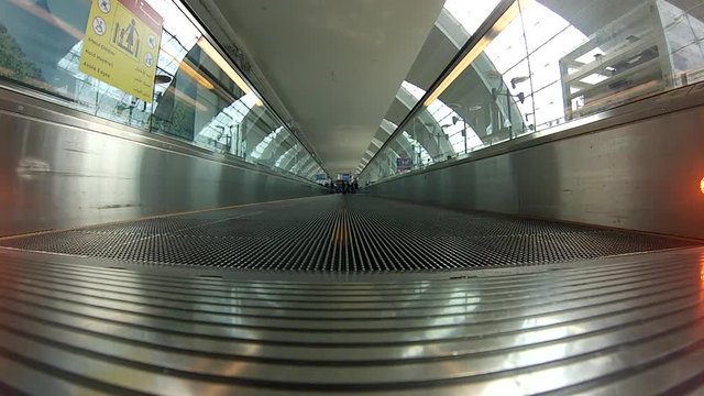 Ground level view of an airport slide walk.